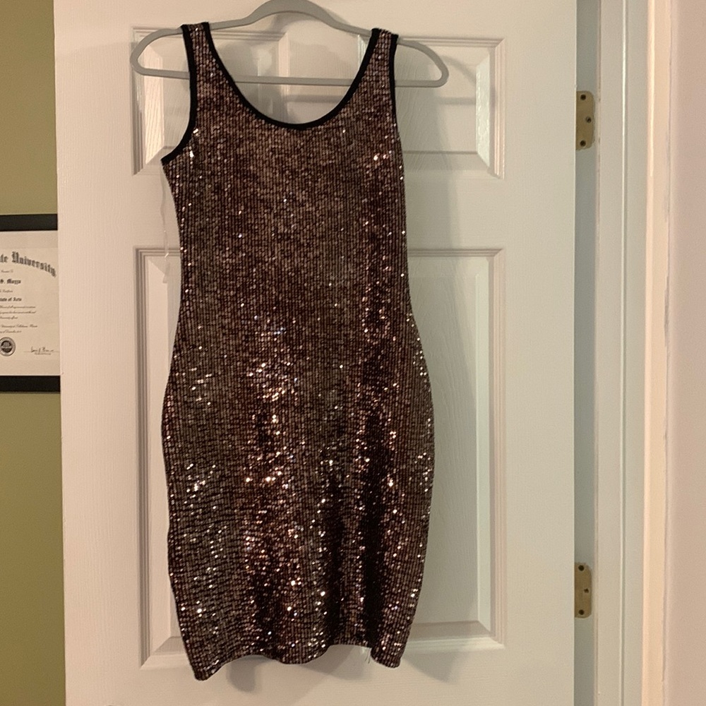 Pinkblush NWTCopper sequence dress size medium on tag but fits like a small.